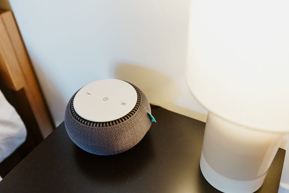 [Bed] Our SNOOZ noise canceling machine does a great job of creating a peaceful environment in our urban location.