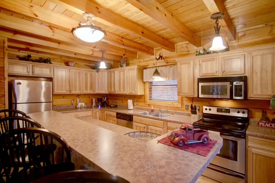 Stay A Little Longer's fully equipped kitchen