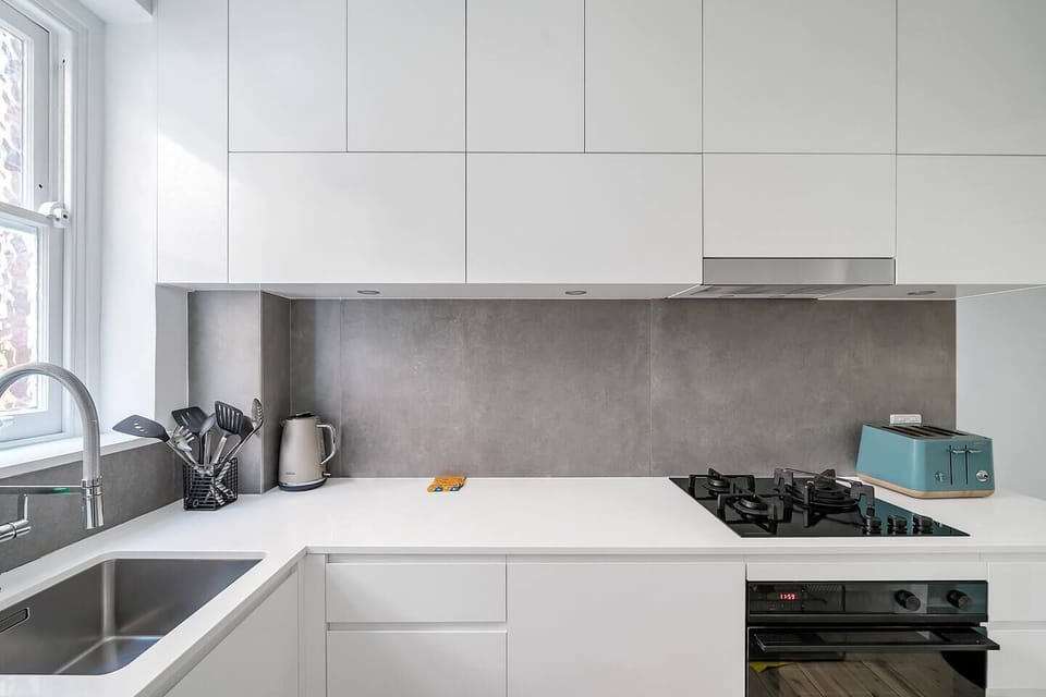 The sleek kitchen is well equipped for your holiday catering, while you’ll find plenty of eateries nearby.