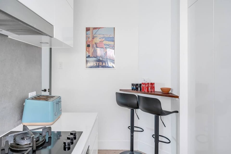 A small dining table makes it easy for guests to come together for a quick bite before heading out.
