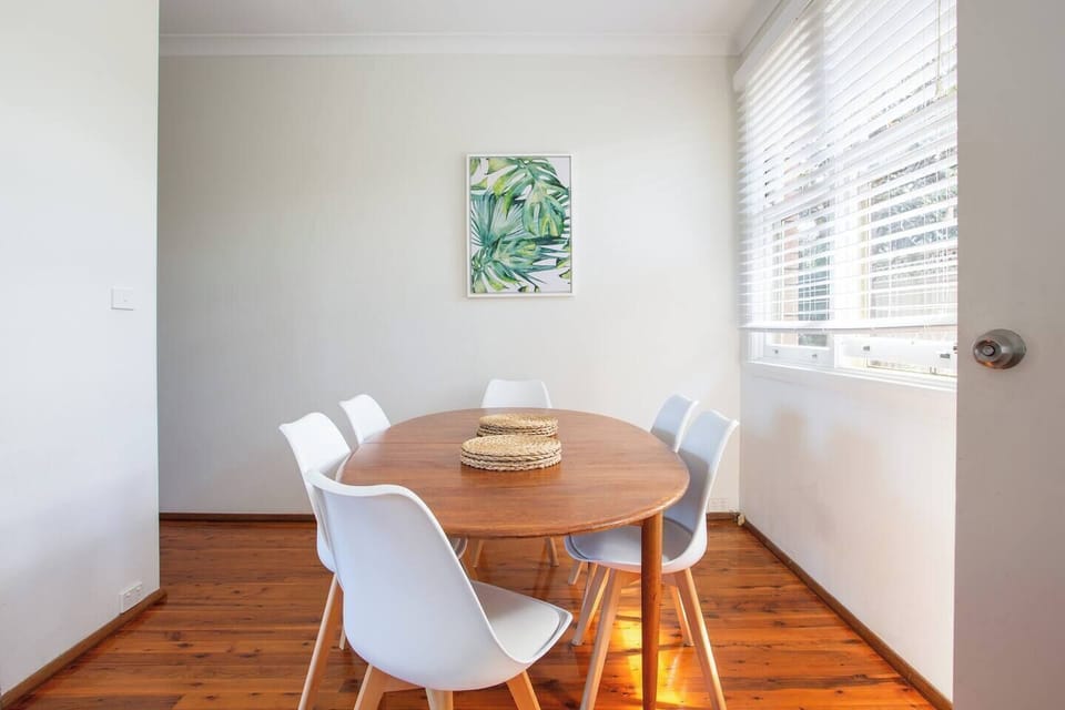 A dining table sitting six adults, perfect for sharing a meal at home with the family.