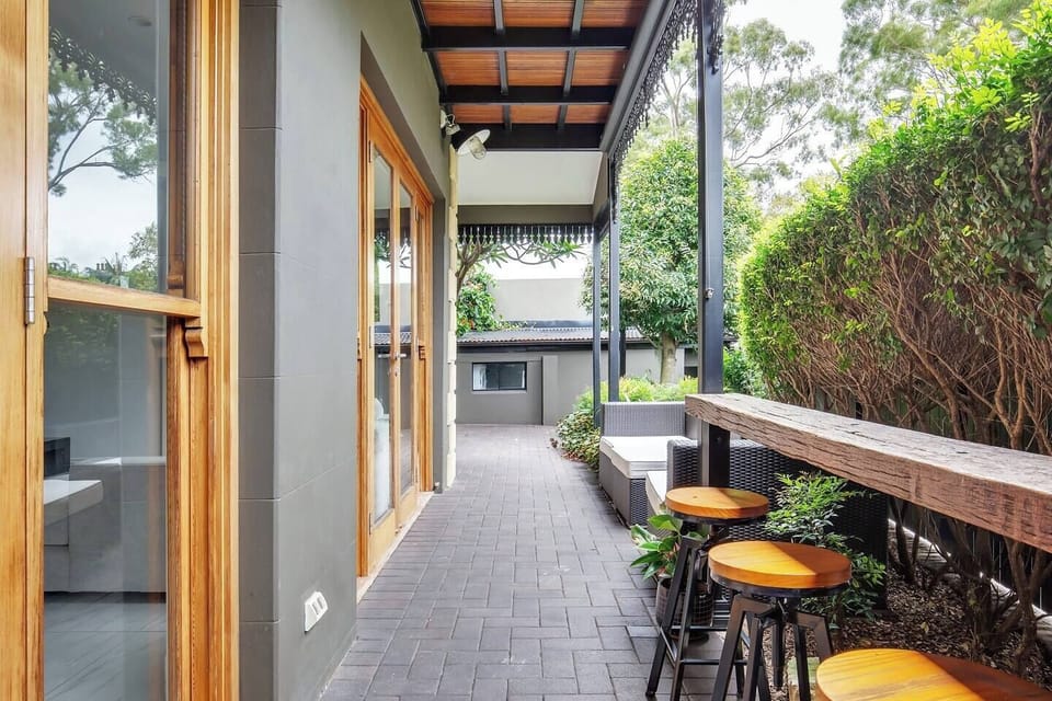 Step outside the kitchen doors to find a ground floor patio with space to dine or relax and unwind on those warmer days