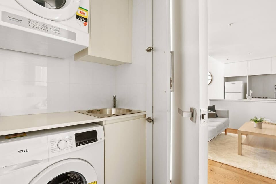 Laundry facilities include a washing machine and dryer. 
