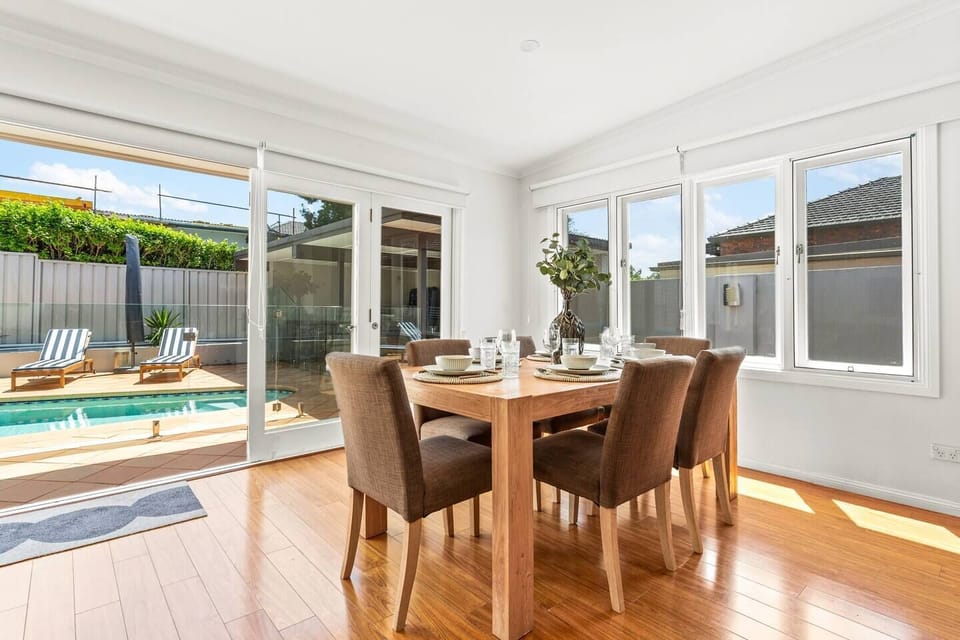Come together around the central dining table or opt to eat outdoors beside the pool.
