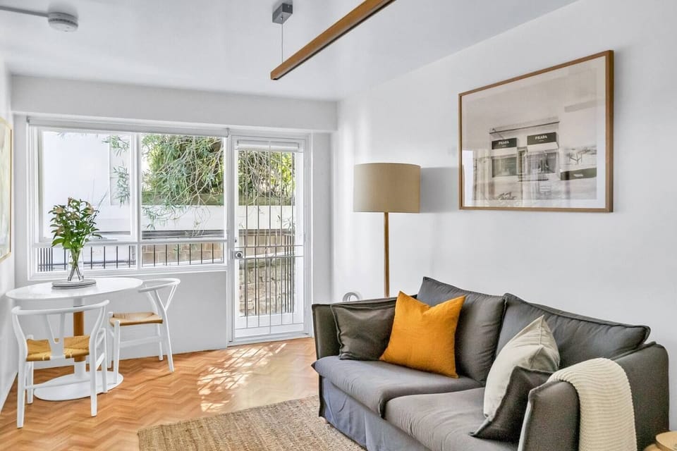 This gorgeous dining setting is perfect for enjoying a meal bathed in sunlight under the double windows. Alternatively, enjoy utilising the private balcony.  