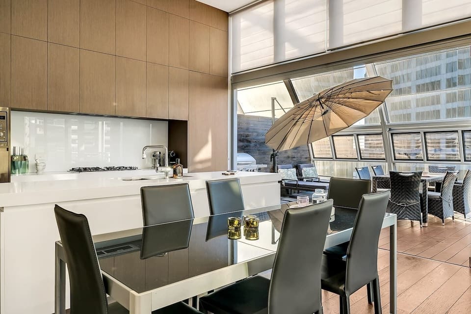 The dining area seats all six guests, while an additional setting is available on the undercover balcony.