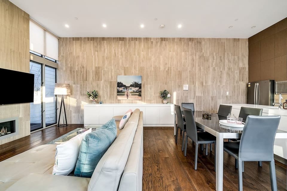  The living and dining area seamlessly blends elegant comfort with a thoughtful layout.