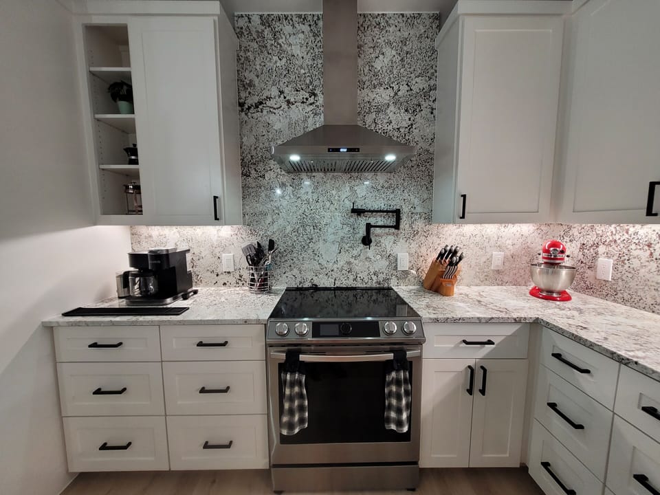 Electric stove, range, vent hood, and coffee/tea station