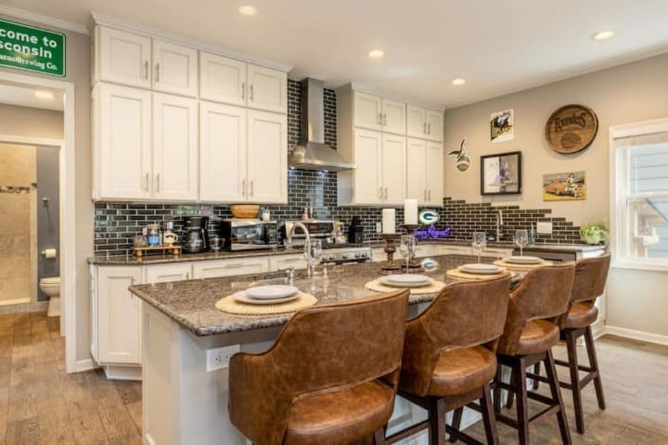 Cook and connect in large open kitchen with seating for large groups