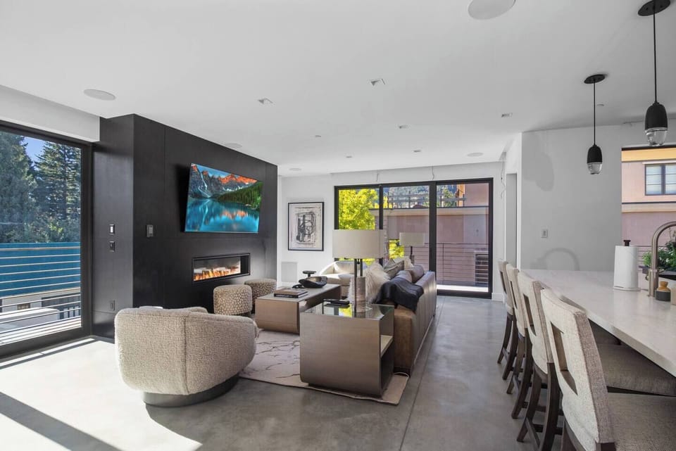 Modern luxury living area with bright
light and Southwest views.