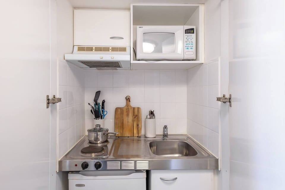 Cook a delicious meal using the kitchenette, equipped with a 2-burner stovetop, mini fridge, microwave, sink and the essentials.

