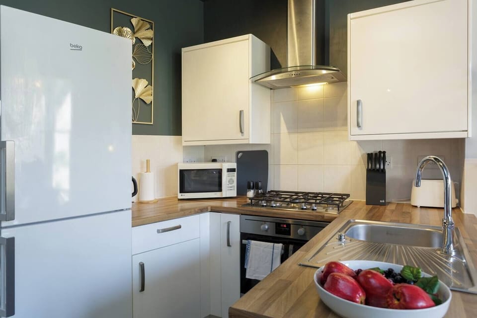 Kitchen Delight: Modern appliances and vibrant decor create the perfect culinary escape!