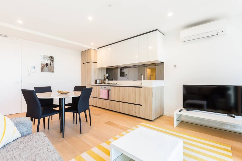 Open plan living and dining makes the apartment feel spacious.