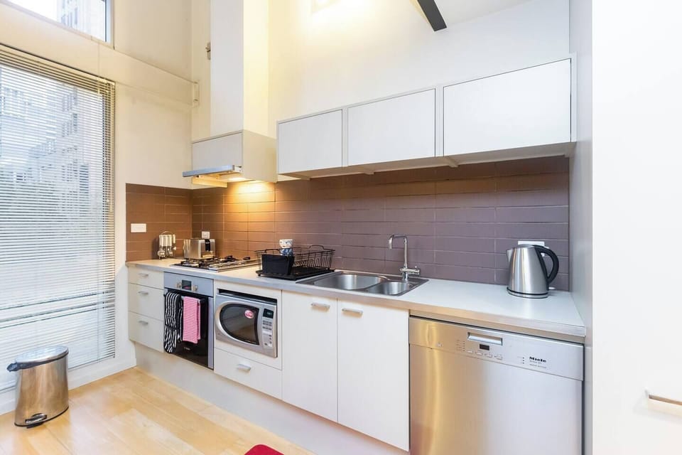 A fully-equipped kitchen makes cooking at home easy. 