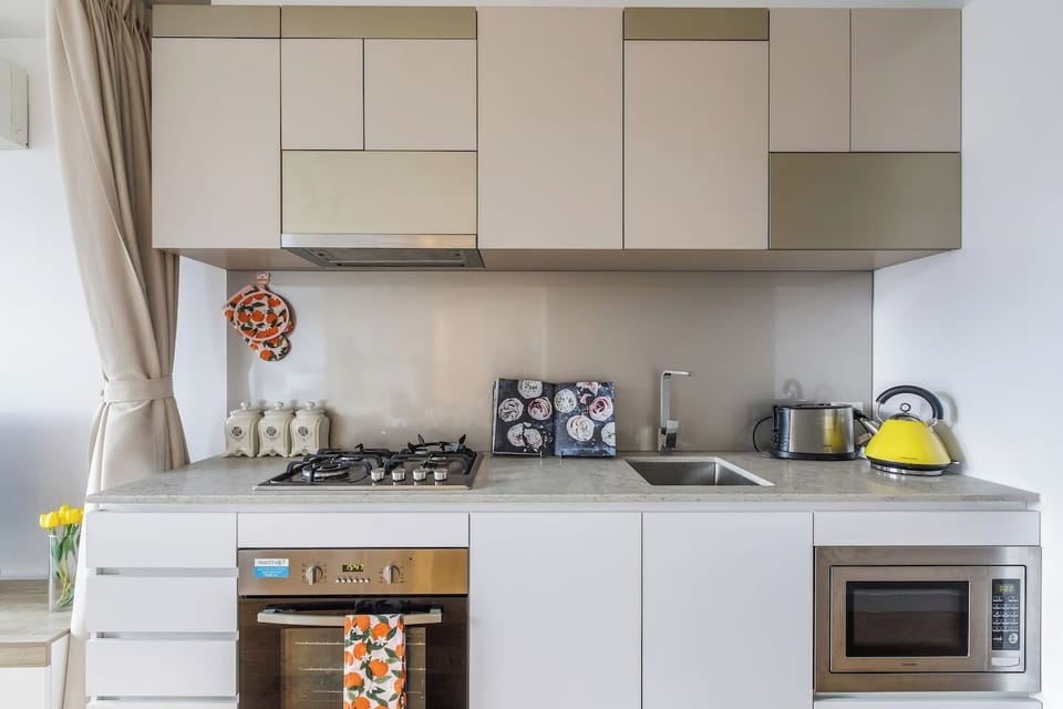 The compact kitchen offers everything you'll need to cook from home.