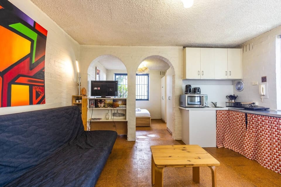 Beautiful archways lead through to the bedroom area.