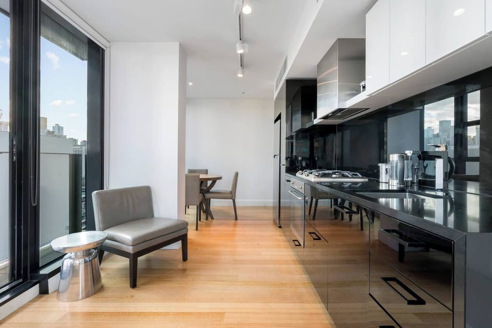 The monochrome kitchen offers everything you'll need to whip up a meal at home.