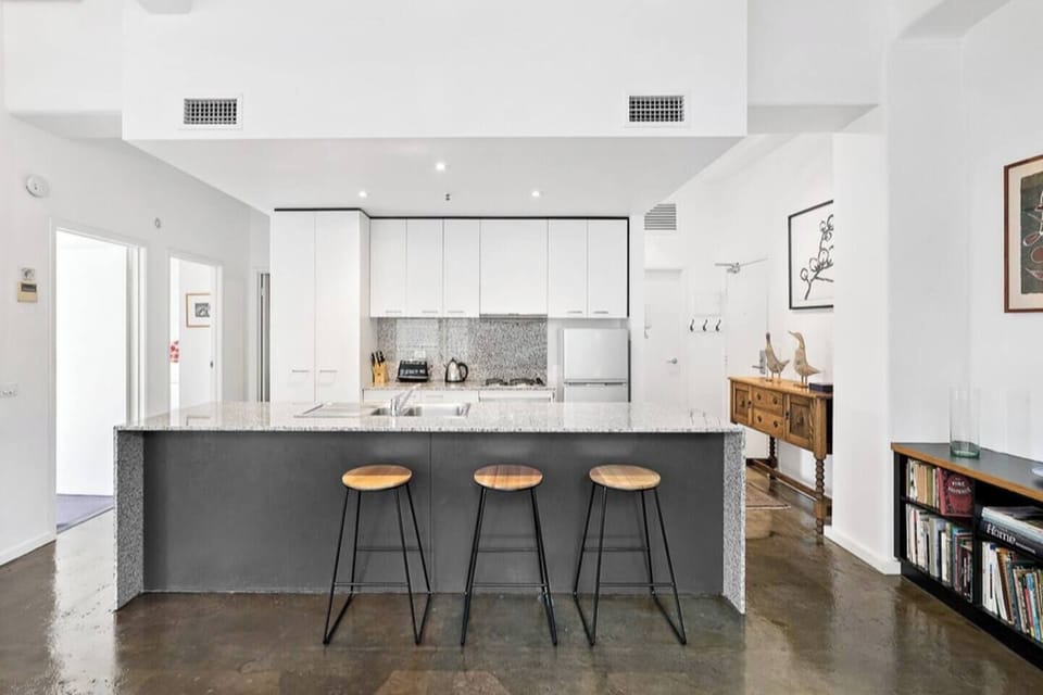 The oversized kitchen island offers seating for you to enjoy a quick bite to eat or set up your laptop and work from home.
