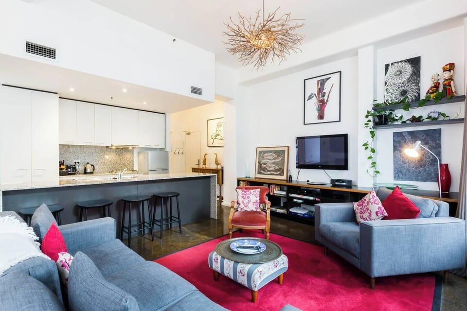 The apartment boasts open-plan living and dining.