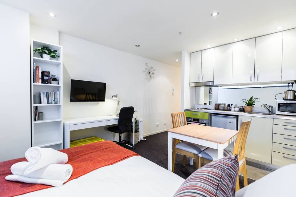 Kick back on the plush queen bed and tune into some TV before getting some sleep.