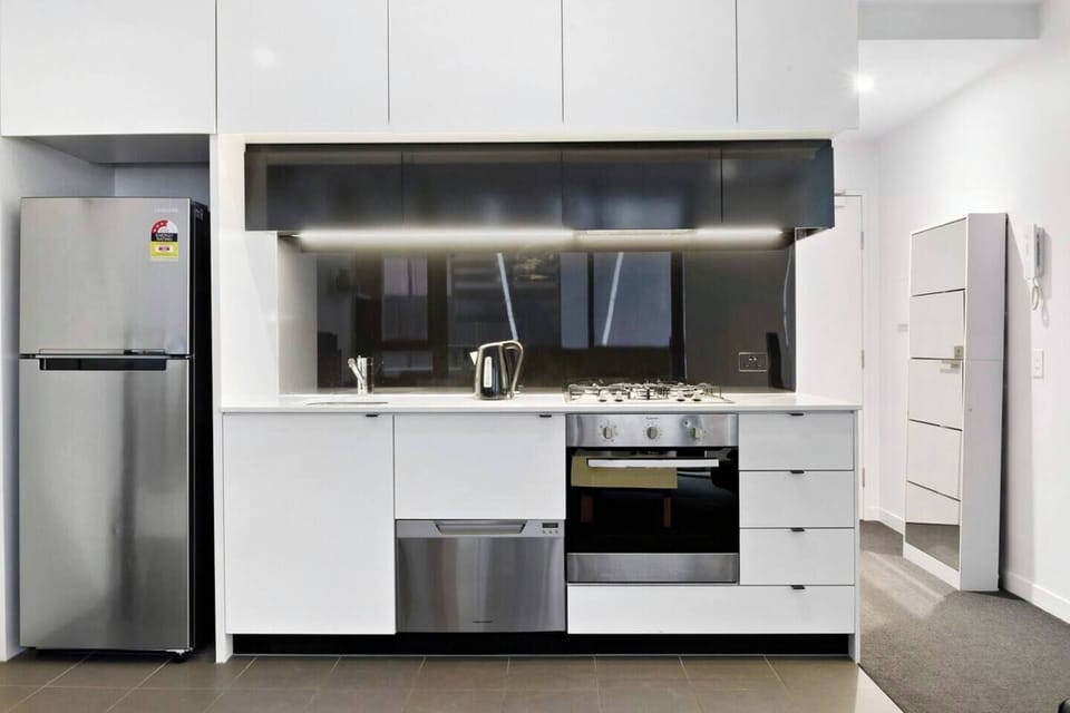 The kitchen is fully-equipped with everything you'll need to cook at home, including a dishwasher for easy clean up.