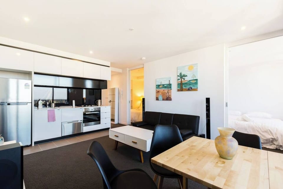 Open plan living and dining flows through to the well-equipped kitchen.