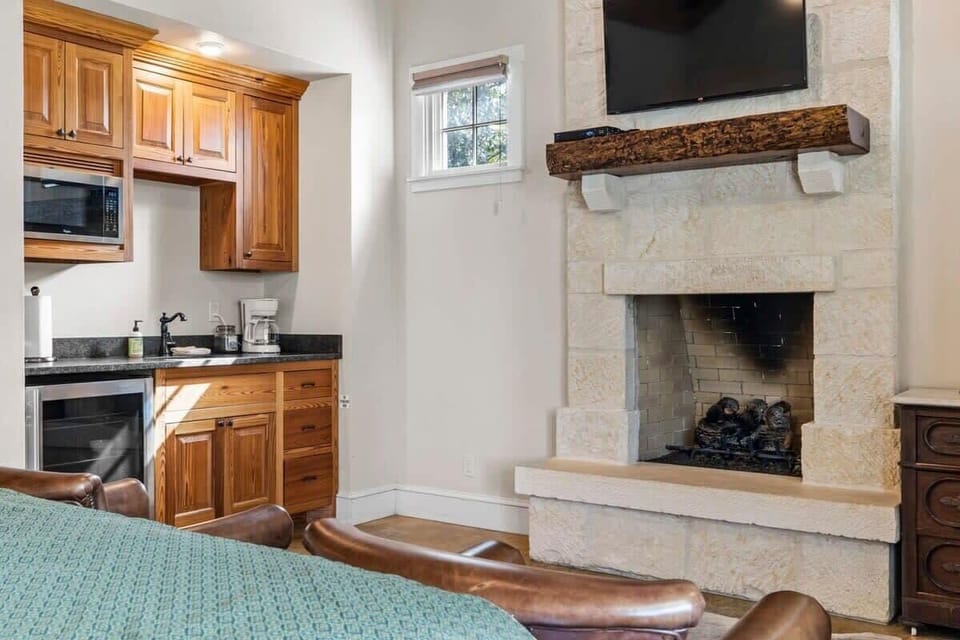 Fireplace and kitchen area