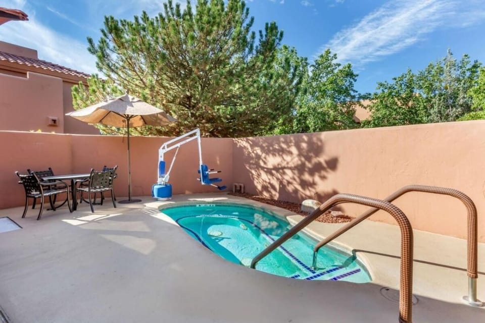 Slip into the sparkling pool for a sunny reset.
