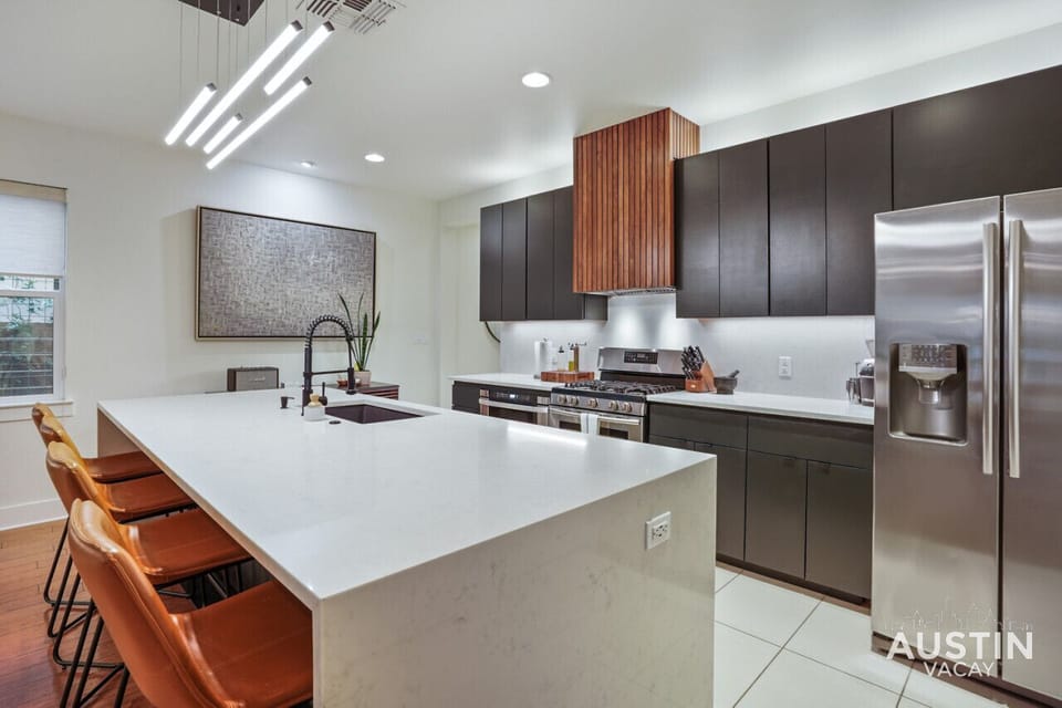 Fully equipped kitchen with all the essentials and beautiful massive waterfall island