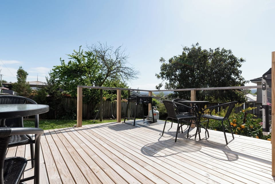 Back deck featuring outdoor dining and a BBQ