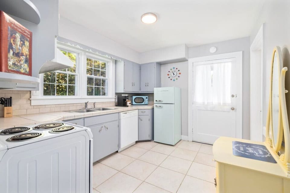 Cooking in this retro-inspired kitchen is a nostalgic experience with all the modern conveniences.