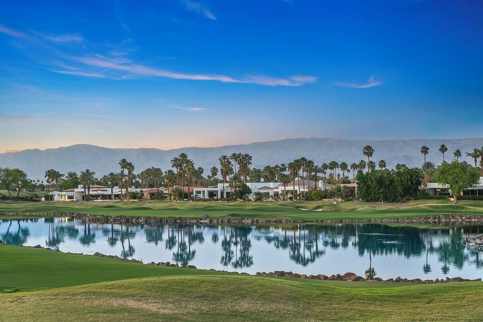 PGA West's iconic 18th hole stretches before you.