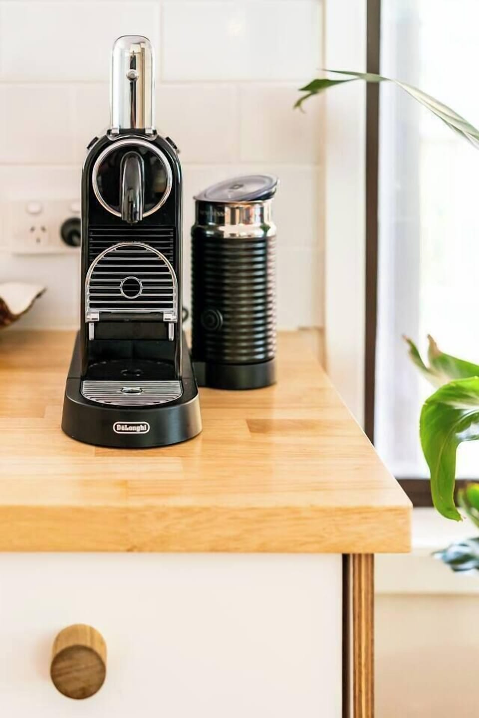 Whip up your morning coffee using the DeLonghi espresso machine.