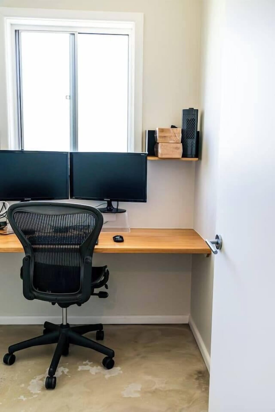 A dedicated office is set with two monitors and a spacious desk so you can plug in and switch on for a day of work at home.