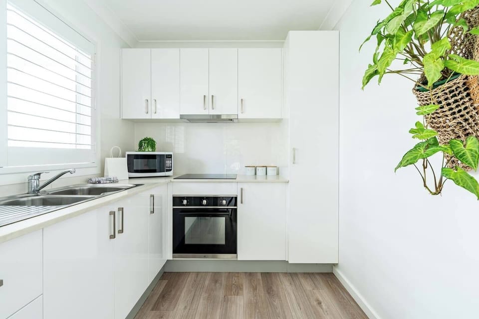 The well-equipped kitchen has all you need to prepare meals at home. 
