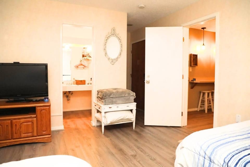 Double, full size beds with private, full bath stocked with basic toiletries.