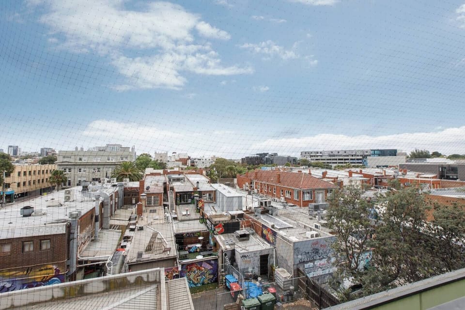 The private balcony overlooks the seaside neighbourhood.