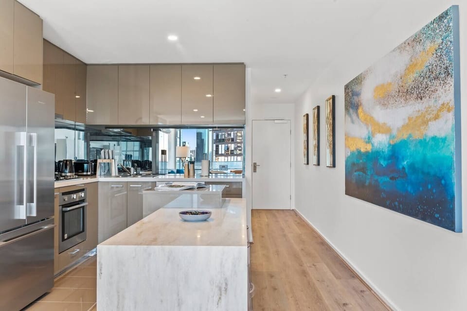The kitchen is well-equipped with contemporary appliances for preparing home-cooked meals. 