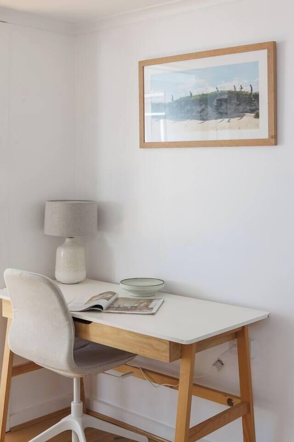 A dedicated study nook caters to those working from home or needing to set up their laptop.
