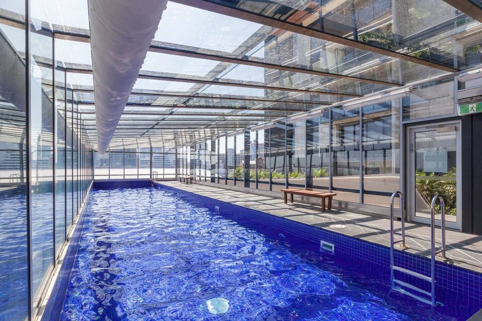 Go for a morning dip in the apartment complex's sparkling communal swimming pool.