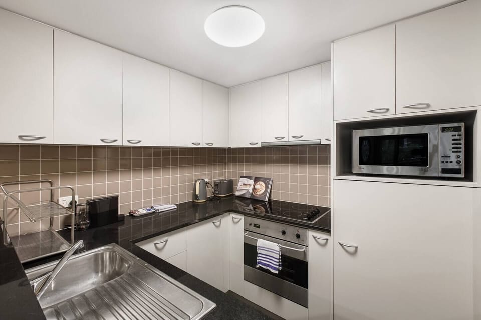 The kitchen offers all the essentials needed to prepare meals at home .
