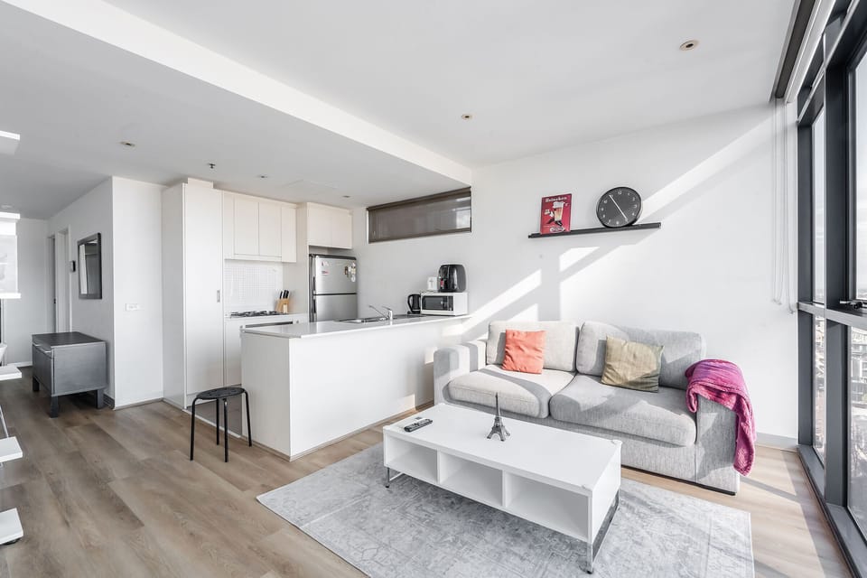 The open-plan living area brings together the kitchen, lounge and dining spaces, creating an easy layout for everyday living.