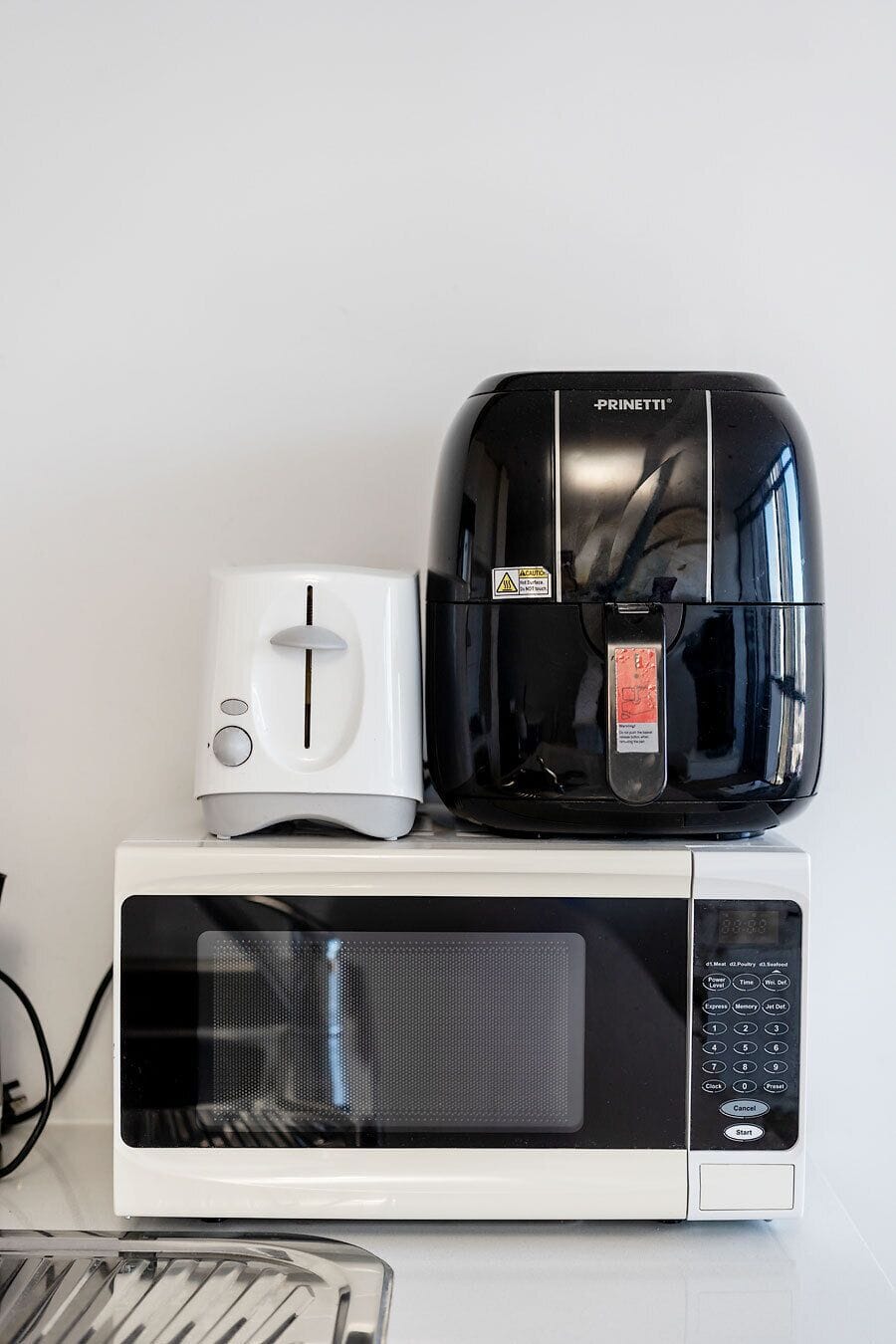 The kitchen includes an air fryer, microwave, kettle and toaster, giving you plenty of options for quick breakfasts or convenient dinners.