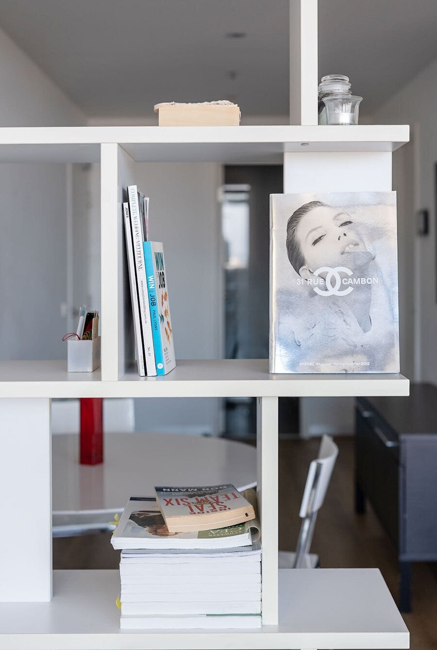 Browse a selection of books or simply enjoy the bright, open layout that connects the living and dining spaces.
