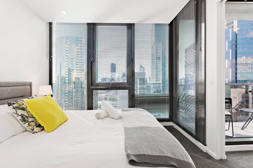 The second bedroom sleeps two in a queen bed where you can relax and enjoy wraparound views.