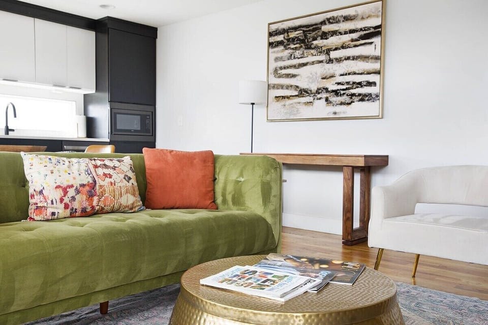 Pops of color and designer furnishings set the tone.