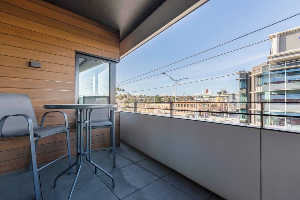 Step outside onto your own private balcony furnished with chairs and a table and enjoy a late-night wine or a morning coffee.