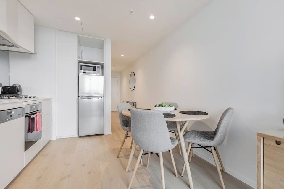 Staying in? Cook up a storm with groceries from the nearby markets and dine at the table for four guests