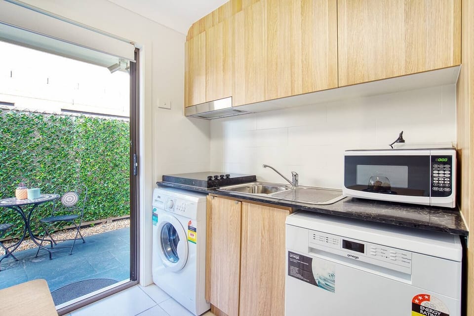 Make use of the in-unit, under-counter washing machine and drying rack available during your stay