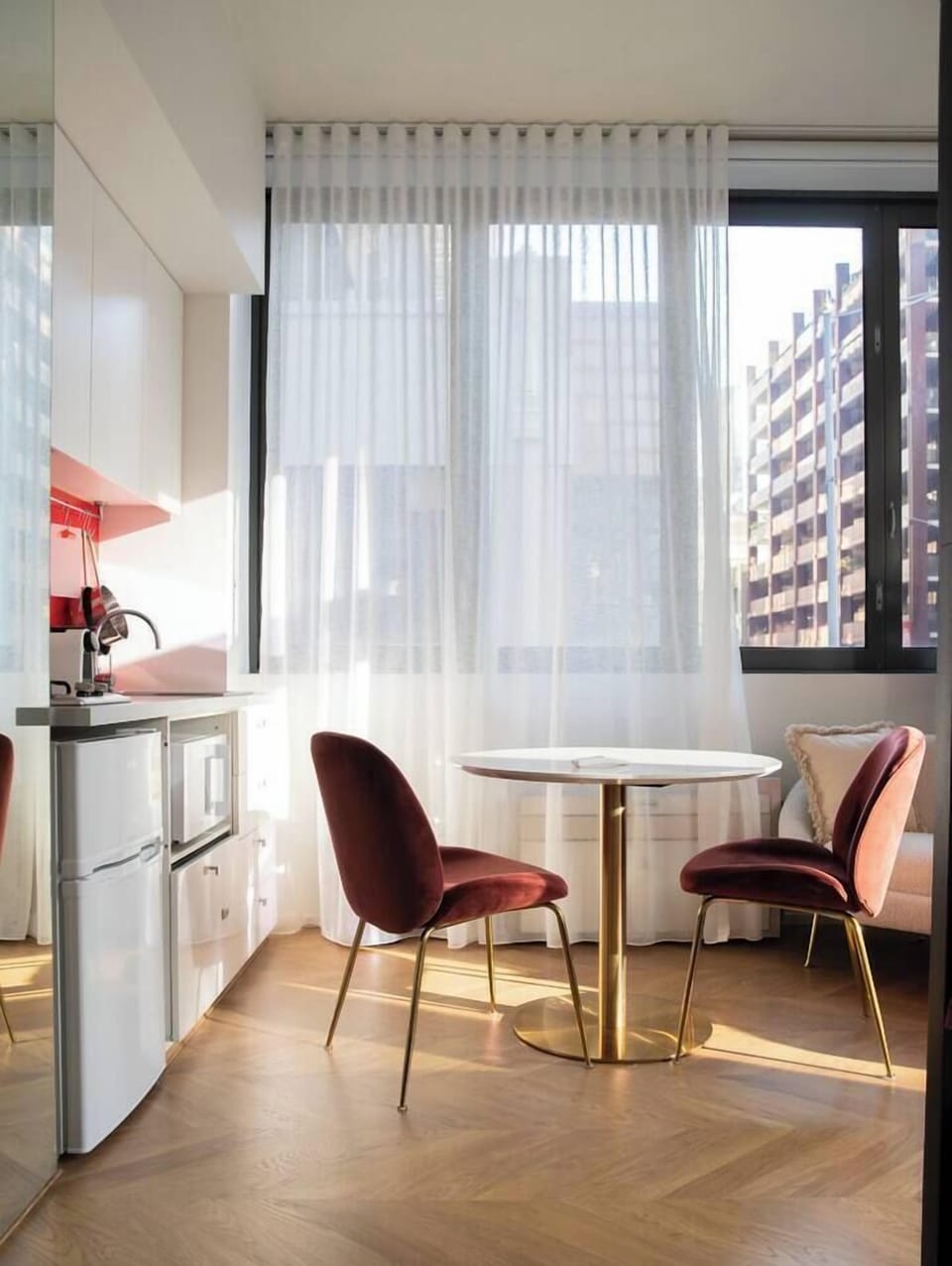 Enjoy relaxed dining at the two-seater table and make use of a dishwasher for easy clean-up. 
